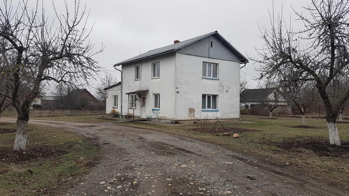 Country house with a fenced yard photographed during a Cottage Ledger inspection in the Kyiv region